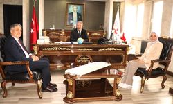 Başdanışman Oruç, aday Bozkurt ile Kaymakama gitti