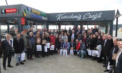 Posbıyık, 'onur plaketi' ile onurlandırdı