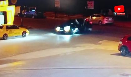 Motosiklet sürücüsü, otomobilin üzerine düştü!