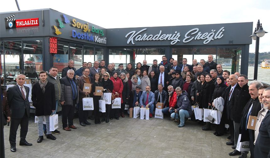 Posbıyık, 'onur plaketi' ile onurlandırdı